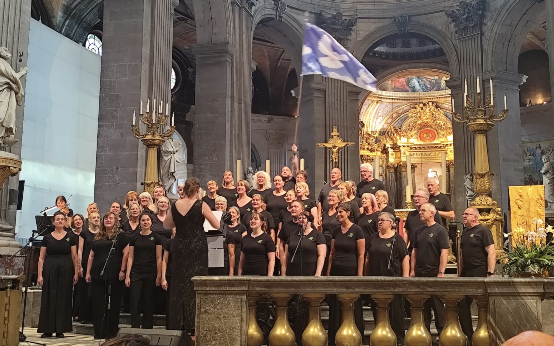The choir sings in St Sulpice